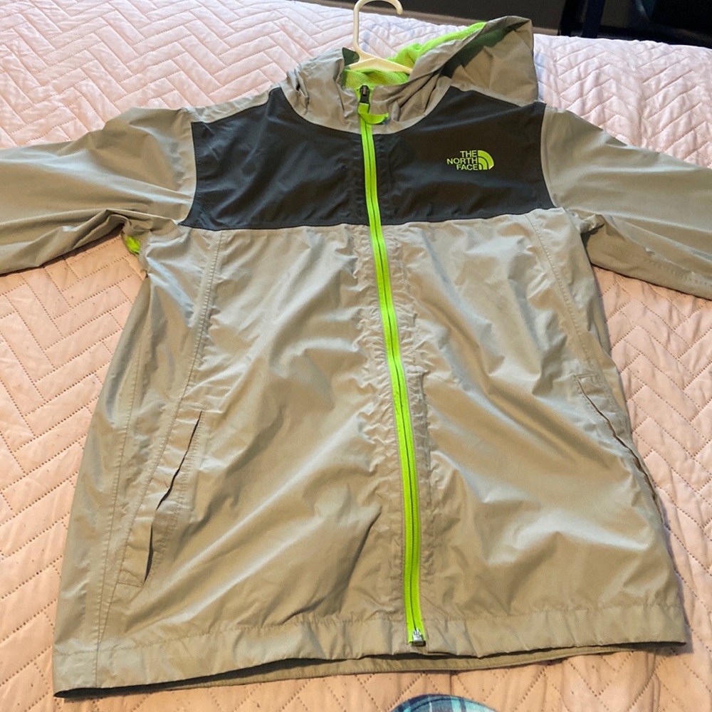 North face rain jacket. Used often. Wearable condition.